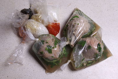 High angle view of vegetables in plastic container