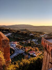 High angle view of cityscape against sky during sunset