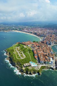 Drone view of a seaside town, gijon, in spain