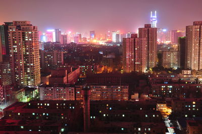 Illuminated cityscape at night