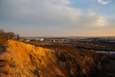 High angle view of land against sky during sunset
