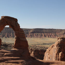 Scenic view of rock formations against clear sky