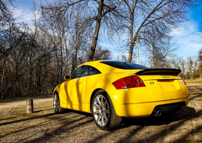 Yellow car against sky