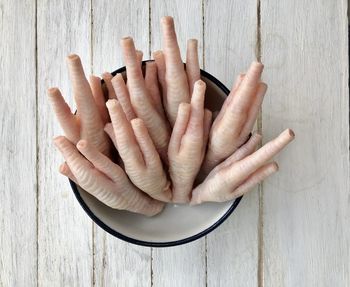 Close-up of hand on table