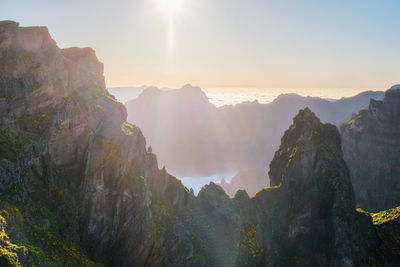 Panoramic view of mountains against sky during sunset