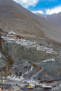 High angle view of buildings on mountain against sky