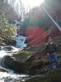 Woman standing on rocks