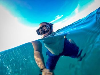 Man swimming in sea