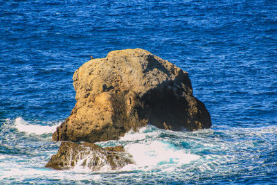 Rock formation in sea