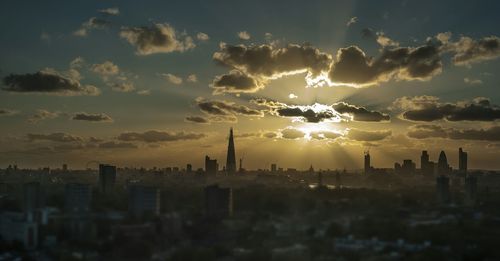 Aerial view of city during sunset