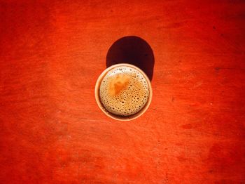 High angle view of coffee cup on table