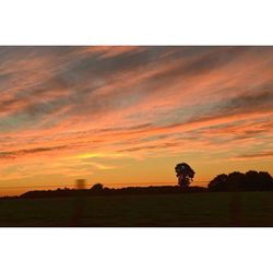 Scenic view of landscape at sunset