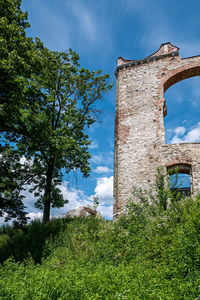 Low angle view of old building against sky