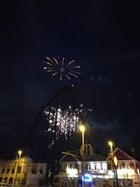 Low angle view of firework display