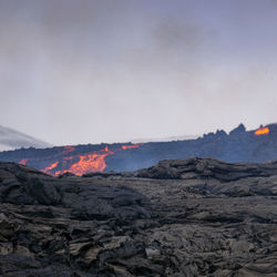 Scenic view of volcanic landscape against sky