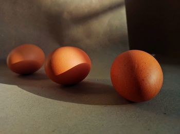 Close-up of oranges on table