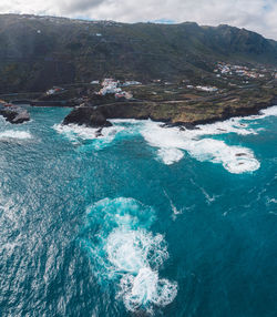 High angle view of sea and mountains