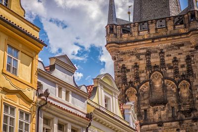 Low angle view of buildings against sky in city