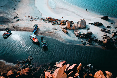 High angle view of people skiing on snow