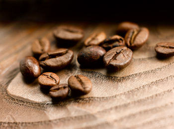 Close-up of coffee beans on table