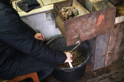 High angle view of man preparing food