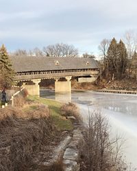 View of bridge over water against sky