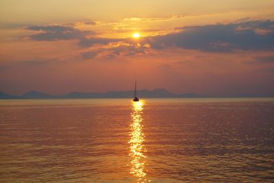 Scenic view of sea at sunset