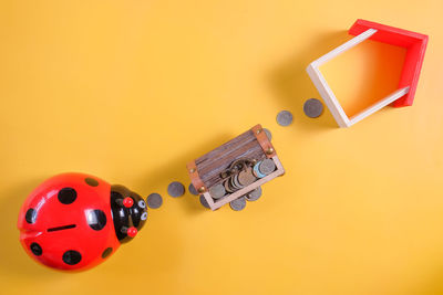 High angle view of text on table against yellow background