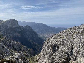 Scenic view of rocky mountains against sky