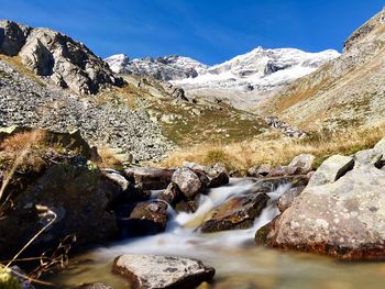 Scenic view of mountains against sky during winter