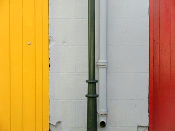 Close-up of yellow door