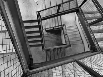 Low angle view of spiral staircase in building