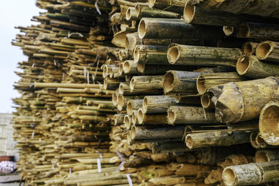 Stack of bamboos at construction site