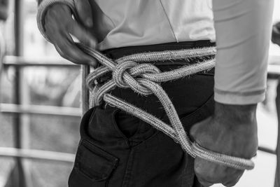 Rappel practitioners preparing the equipment to perform the activity next. salvador bahia brazil.