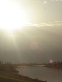 Scenic view of landscape against sky during sunset