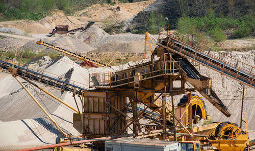 Gravel quarrying in a gravel pit during a drone flight