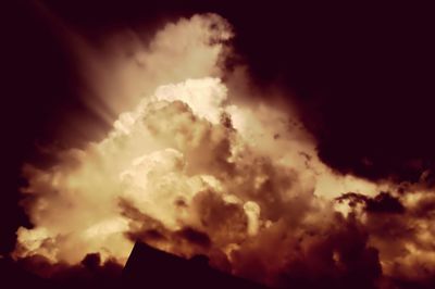 Low angle view of cloudy sky at sunset