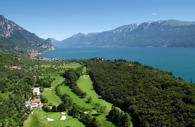 High angle view of trees and mountains against sky