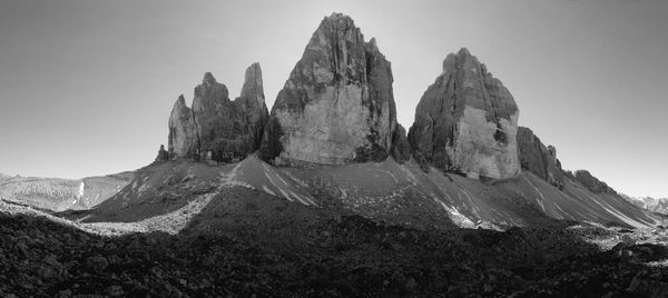 Panoramic view of mountains against clear sky