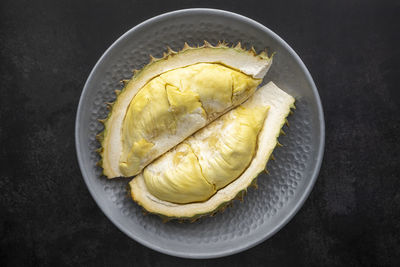 High angle view of lemon slice in bowl on table