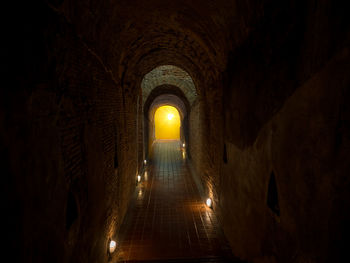 Illuminated tunnel in old building