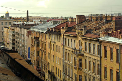 High angle view of residential buildings against sky