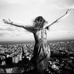 Woman standing in city