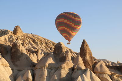 Low angle view of hot air balloons against sky