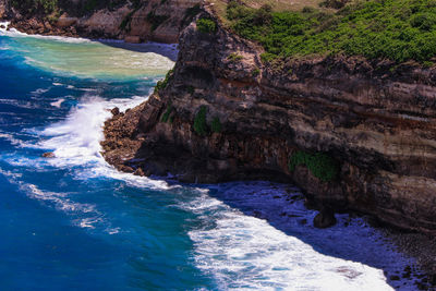 Scenic view of rocks in sea