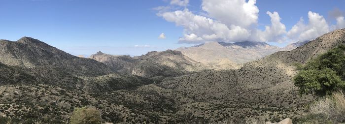 Panoramic view of landscape and mountains against sky