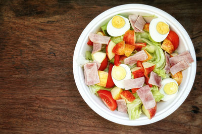 High angle view of salad in bowl on table