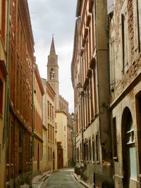 Street amidst buildings in city