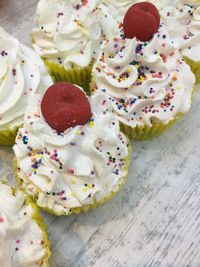 High angle view of cupcakes on table