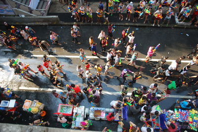 High angle view of people on street in city